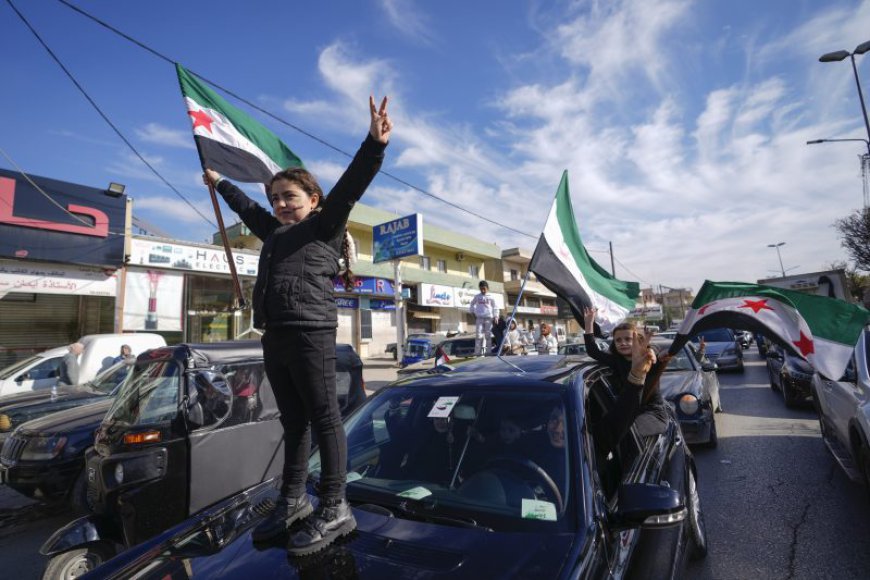 Jubilation, gunfire as Syrians celebrate the end of the Assad family's half-century rule