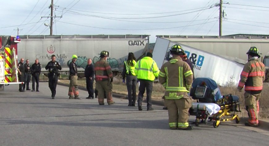 Train splits semi-trailer in half near Webb City