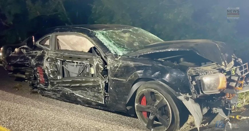 CAMARO OVERTURNED, DESTROYED IN CRASH