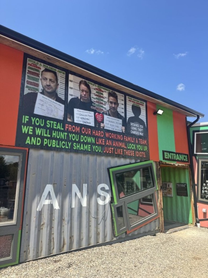 Gun store calls out alleged thefts with billboard-sized sign
